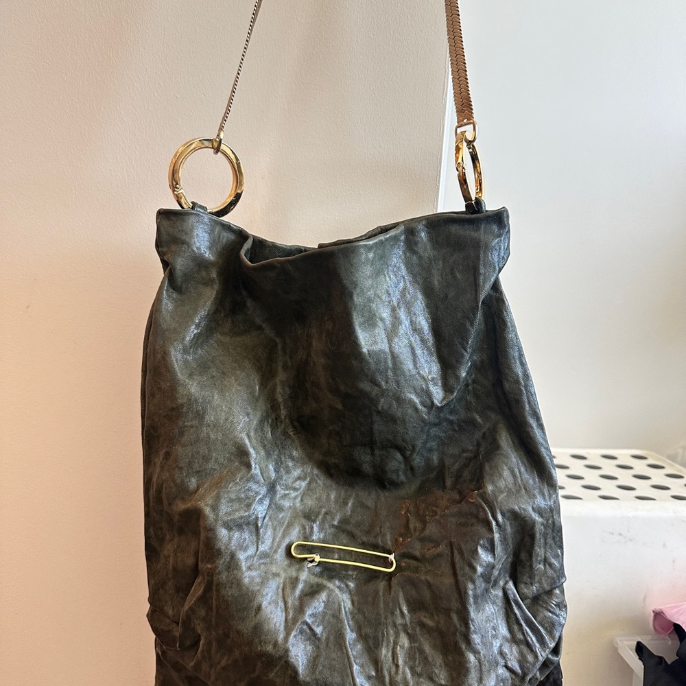 Dark green soft leather bag with gold detailing